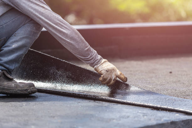 Professional Basement Waterproofing technician working in Rochester, IL
